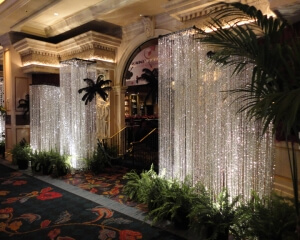 Beaded Column Décor From Turn of Events Las Vegas. Rental Drapery, Pipe and drape in Las Vegas. Duvetyne Drapery and More for all your drapery rental needs.