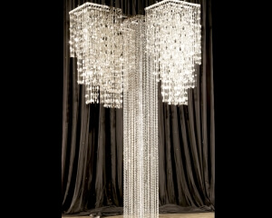 Floor Standing Quad Chandelier Décor From Turn of Events Las Vegas. Rental Drapery, Pipe and drape in Las Vegas. Duvetyne Drapery and More for all your drapery rental needs.