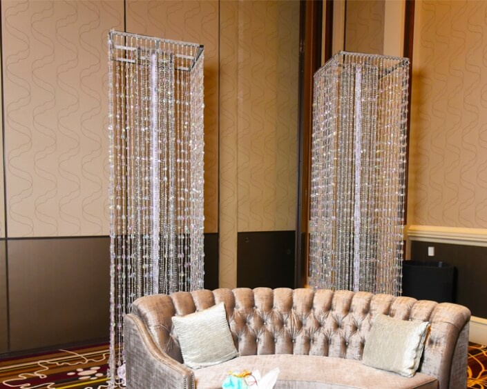 Beaded Column Décor From Turn of Events Las Vegas. Rental Drapery, Pipe and drape in Las Vegas. Duvetyne Drapery and More for all your drapery rental needs.