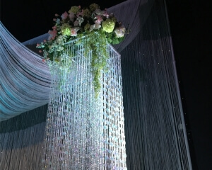 Beaded Column Décor From Turn of Events Las Vegas. Rental Drapery, Pipe and drape in Las Vegas. Duvetyne Drapery and More for all your drapery rental needs.